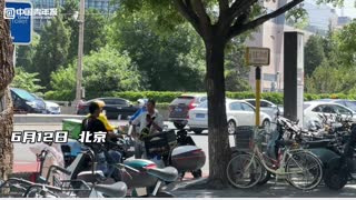 高温下的快递小哥：“多赚点”是最大期望