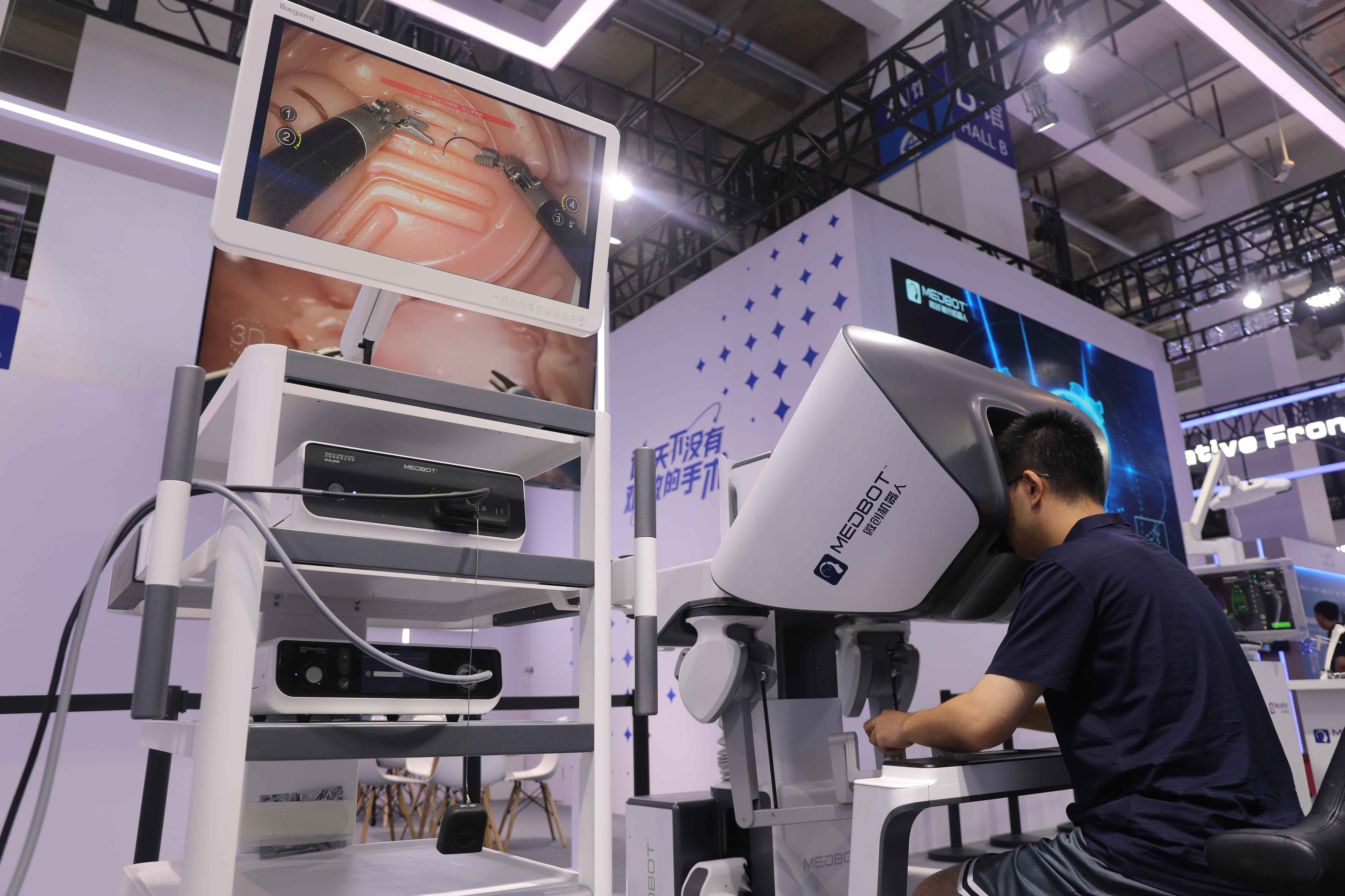 特斯拉推进Optimus机器人大规模量产,机器人ETF(159770)半日涨0.64%,亿嘉和涨停